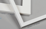 Large - 2" wide white frame and small - 1" wide white frame