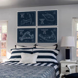 Navy custom maps of Cape Cod, Marthas Vineyard, Nantucket and Tuckerneck Island on display over a bed