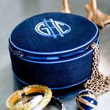 Hand Embroidered Round Jewelry Case in navy with blue and white lettering