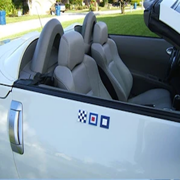 Nautical Letter Tiles shown on a car