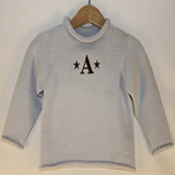 Light blue rollneck sweater with brown times large w/ stars monogram