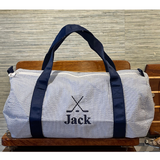 Navy Seersucker Duffle with Navy "Jack" monogram and navy hockey stick and puck icon