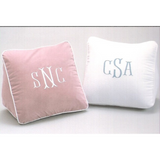 Pink and white wedge pillows with monograms