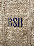 Close up of monogram on the Straw Bag