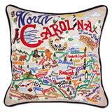North Carolina hand embroidered pillow with black velvet piping