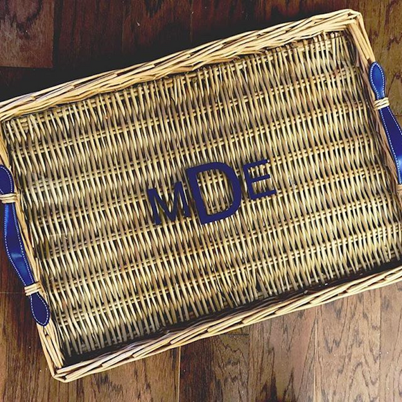Wicker island tray with navy vegan leather handles and navy monogram